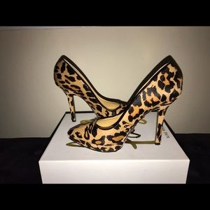 Leopard print calf hair platform pumps